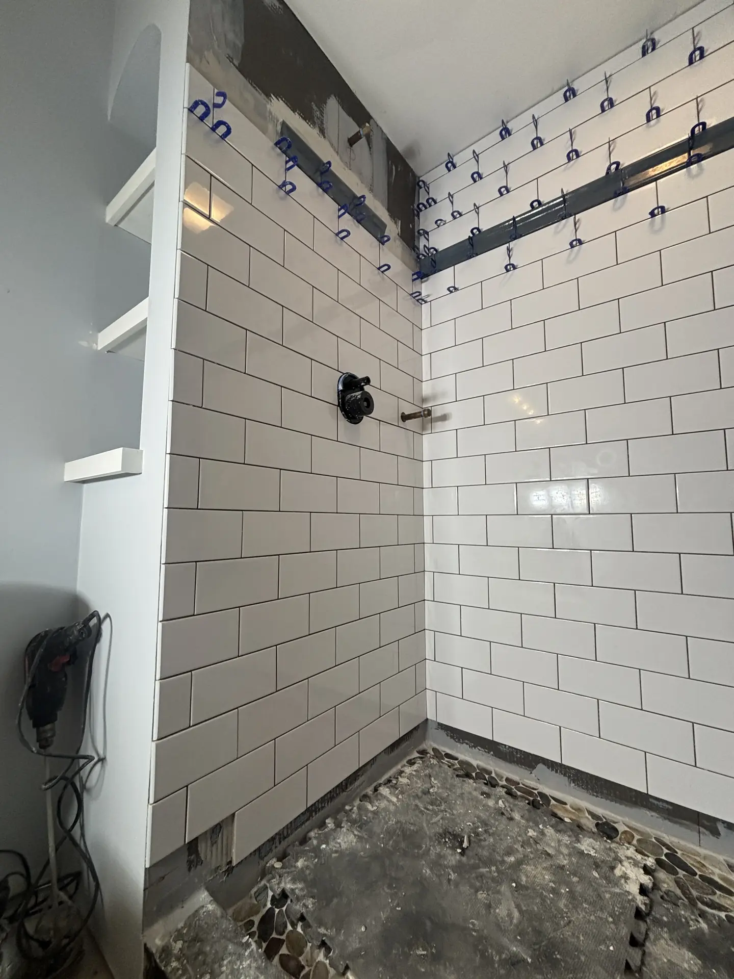 Shower tile nearing completion
